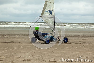 Beautiful shot of a person driving blokart on the sandy beach Editorial Stock Photo