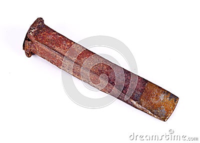 A rusted iron splitting wedge Stock Photo