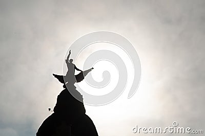 Beautiful shot of the silhouette of a sculpture on a cloudy day in Bilbao, Spain Stock Photo