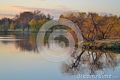 Beautiful shot of the Sloan lake in the autumn with park in the background Stock Photo