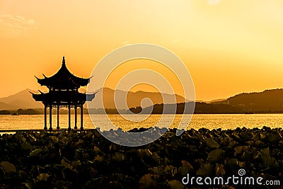The beautiful of silhouette sunset landscape scenery of Xihu West Lake and pavilion in Hangzhou CHINA Stock Photo