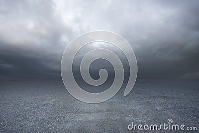 Beautiful simple dark gravel background with mist and clouds Stock Photo