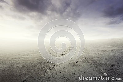 Beautiful simple gravel background with mist and clouds Stock Photo