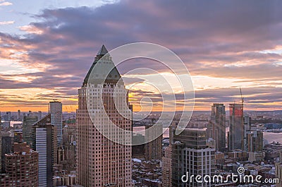 Beautiful Sky Colors During Sunset in New York City Skyline. Aerial View of Buildings, Skyscrapers and Towers in Manhattan Stock Photo