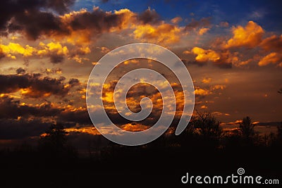 Beautiful sky twilight time sunset clouds orange blue yellow mood peace calm peaceful landscape Stock Photo