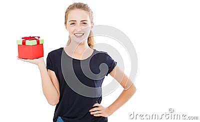 Beautiful smile blonde holding gift over isolated background with surprise face pointing finger to himself,copy space Stock Photo