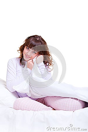 Beautiful smiley woman in the bed Stock Photo