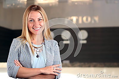 The Beautiful smiling business woman portrait. Smiling female receptionist Stock Photo