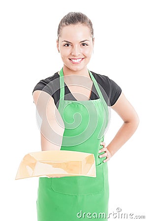 Beautiful smiling employee offering empty plate Stock Photo