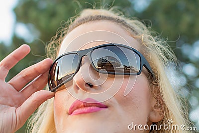 beautiful smiling girl wears sunglasses Editorial Stock Photo