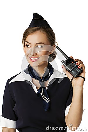 Beautiful smiling stewardess with cb radio Stock Photo