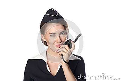 Beautiful smiling stewardess isolated on a white background Stock Photo