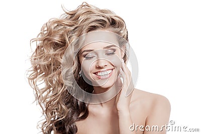 Beautiful Smiling Woman. Healthy Long Curly Hair Stock Photo