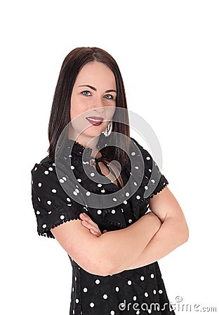 Beautiful smiling woman in a pock dot dress Stock Photo