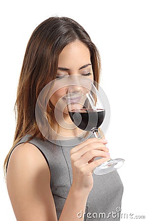 Beautiful sommelier woman tasting wine Stock Photo