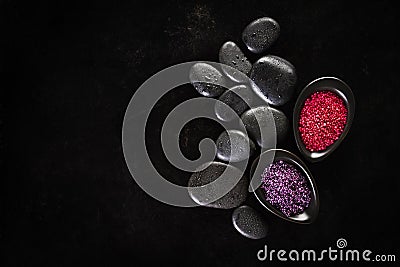 Beautiful Spa Set Spa Products with Essential Oils, Soap, Towel, Spa Sea Salt on Dark Wet Background. Horizontal Stock Photo