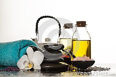 Beautiful Spa Set with Spa Products, Towel and Hot Stones. Horizontal with Copy Space. Stock Photo