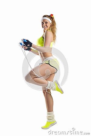 Beautiful sportsgirl with skipping rope Stock Photo
