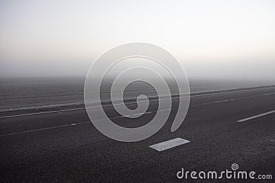 A beautiful springtime scenery with asphalt road in Latvia. Stock Photo