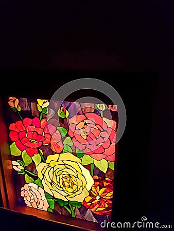 Beautiful stained glass window in old fashioned luxury property in Eureka Springs Stock Photo