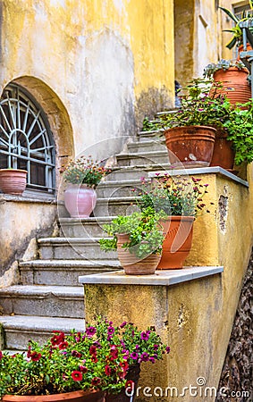 Beautiful stair of cozy alley on Acropolis slope in Athens Stock Photo