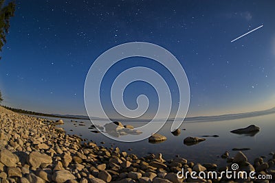 Beautiful starry sky over lake Baikal. Stock Photo