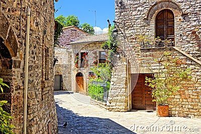 Beautiful stone buildings of the old town of Assisi, Italy Stock Photo