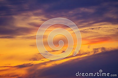 Beautiful stormy sunset sky. Cloudy abstract background. Sunset colors. Blurred shot of the dramatic sunset Stock Photo