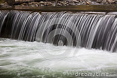 Beautiful streams and small waterfalls near the big Carpathian waterfall Shypit. Stock Photo