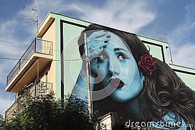 Beautiful street art graffiti mural in Stornara, Puglia, Italy Editorial Stock Photo
