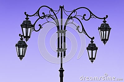 Beautiful street lamp of wrought iron Stock Photo