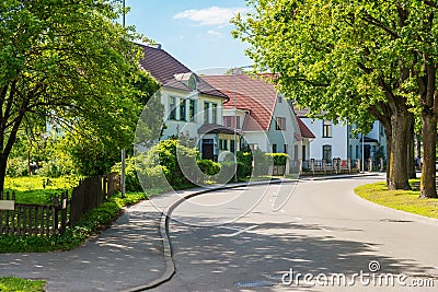Beautiful street with modern residential houses in summer sunny Stock Photo