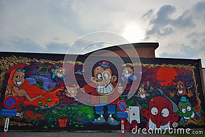 Beautiful streetart, various figures on a wall Editorial Stock Photo