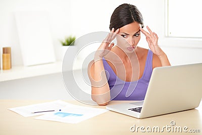 Beautiful stressed woman working on the computer Stock Photo