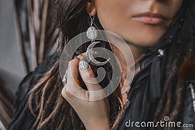 Beautiful stylish woman with a lot of gem stones accessories close up portrait Stock Photo