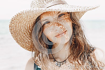 Beautiful stylish young woman portrait with hat shadow on face Stock Photo