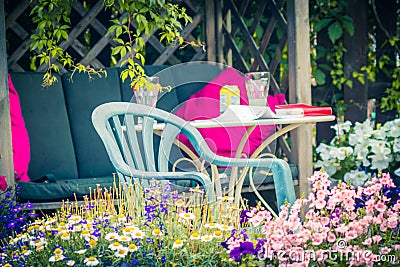 Beautiful, Summer garden with amazing blossom in big flowerpots Stock Photo