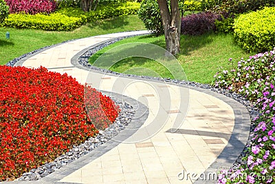 Beautiful summer garden with a walkway Stock Photo