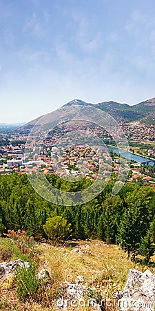 Beautiful summer landscape. View of Trebinje city and Trebisnjica river from Crkvina Hill on sunny day. Bosnia and Herzegovina Stock Photo