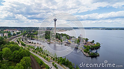 Beautiful summer panorama of Tampere city at summer day. Lakeside amusement park Stock Photo