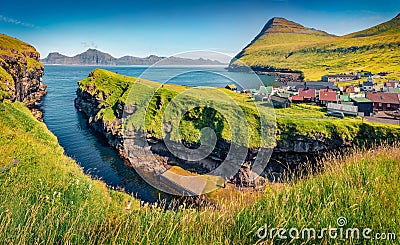 Beautiful summer scenery. Bright morning view of Gjogv village. Stock Photo