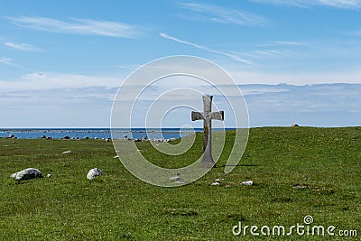 Beautiful summer view with a stone cross from the south end of Stock Photo