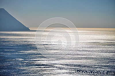 Beautiful sun glare on the surface of the sea Stock Photo