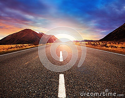 Beautiful sun rising sky with asphalt highways road in rural sce Stock Photo