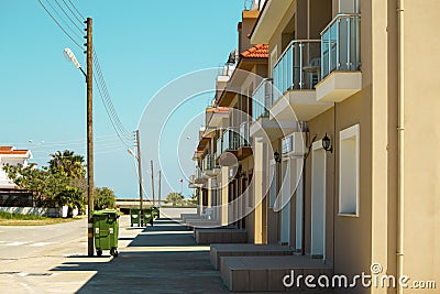 Sunny street with small modern houses Stock Photo