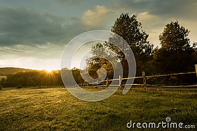 Beautiful sunrise on the farm Stock Photo