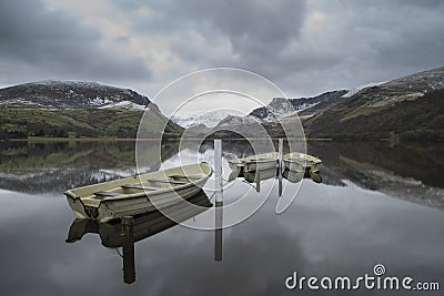 Beautiful Winter landscape image of Llyn Nantlle in Snowdonia Na Stock Photo