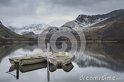 Beautiful Winter landscape image of Llyn Nantlle in Snowdonia Na Stock Photo