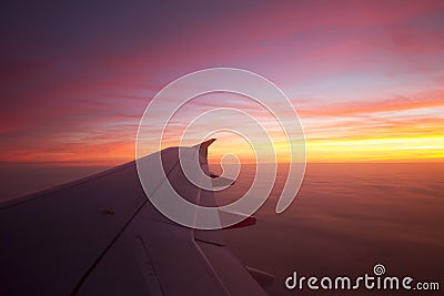 Beautiful Sunrise out of Plane Window Stock Photo