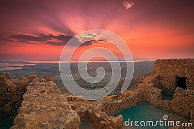 Beautiful sunrise over Masada fortress Stock Photo